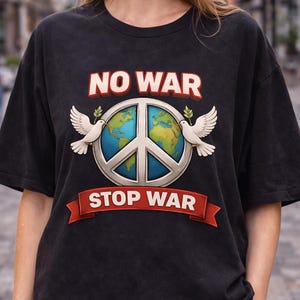 May include: Black t-shirt with the words "NO WAR" above a peace symbol with a globe in the center. Two white doves with olive branches flank the peace symbol. The words "STOP WAR" are on a red banner below.