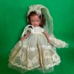 1940’s Nancy Ann Family Doll collection. The Bride