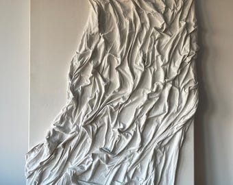 Textured fabric wall art – a handcrafted 3D sculpture on canvas, offering a unique blend of minimalism and modern aesthetics.
