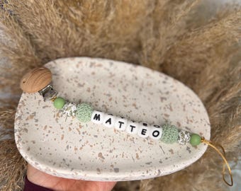 Attache tétine