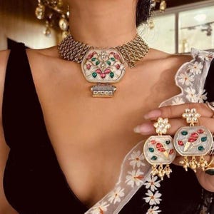 fine Amrapali dull gold fusion necklace set with earrings