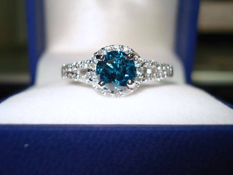 white gold ring with blue diamond