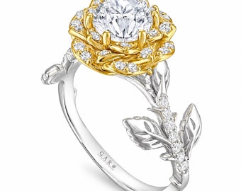 May include: A ring featuring a large round brilliant-cut center diamond surrounded by a yellow gold floral setting with small diamonds. The band is crafted in silver-toned metal, shaped like a stem with leaves and small diamonds, with GAR engraved.