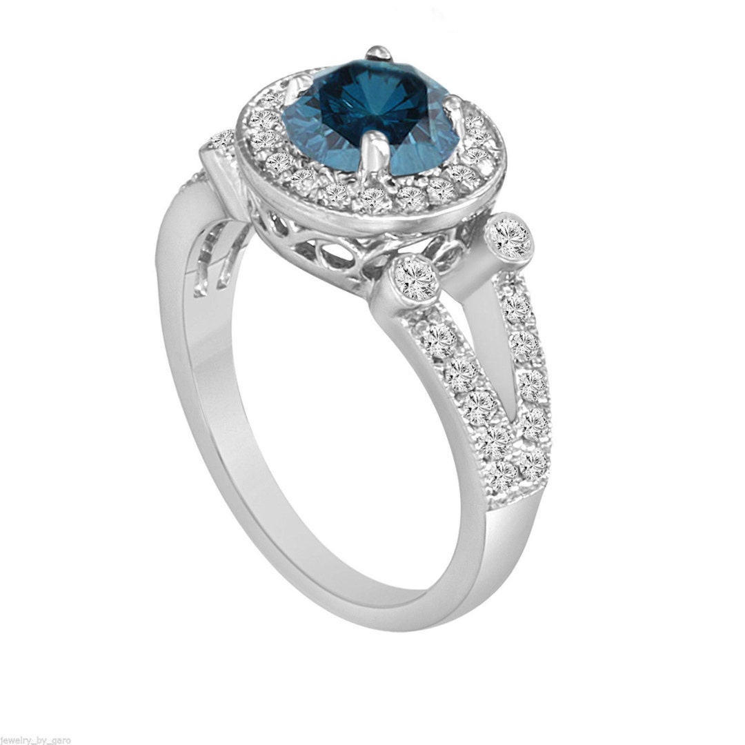 Platinum ring with blue best sale diamond