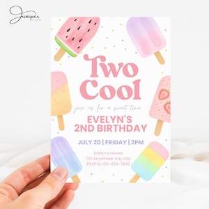 May include: A birthday invitation with a popsicle theme. The invitation features the text "Two Cool" in pink, along with the details for Evelyn's 2nd birthday. Popsicle illustrations in various colors surround the text.