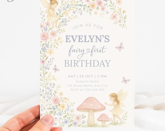 May include: A pastel-colored invitation for Evelyn's first birthday. The design features floral elements, fairies, and the text "EVELYN'S fairy first BIRTHDAY". Includes date, time, and RSVP information.