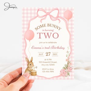 May include: A pink and white birthday invitation with the text "Some Bunny is turning TWO." The invitation features a watercolor illustration of a bunny, balloons, and floral accents. The date is December 27th.