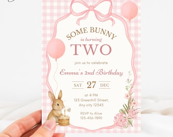 May include: A pink and white birthday invitation with the text "Some Bunny is turning TWO." The invitation features a watercolor illustration of a bunny, balloons, and floral accents. The date is December 27th.