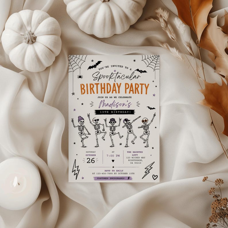 The image is a Halloween-themed birthday party invitation featuring a group of dancing skeletons, a spider web, and autumn leaves.
