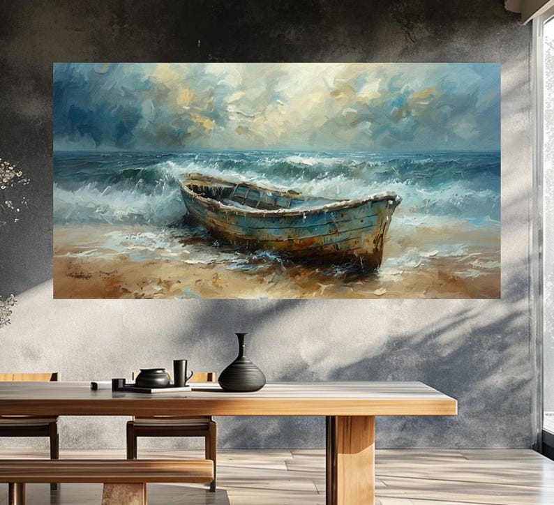 May include: An oil painting depicts a weathered blue boat beached on a sandy shore, with foamy waves crashing around it. The sky is filled with dramatic clouds, creating a moody coastal scene. The artwork is displayed on a wall.