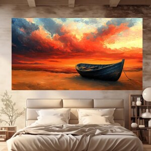 May include: A painting of a wooden boat on a beach at sunset. The sky is a vibrant orange and red with fluffy clouds. The boat is dark brown and is sitting on the sand.