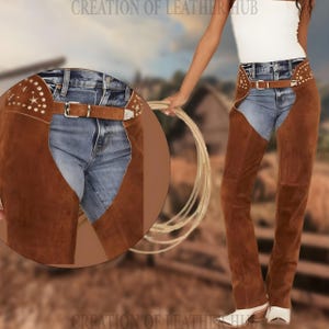 May include: Brown suede leather chaps with star-shaped studs and a belt. The chaps are worn over blue jeans.