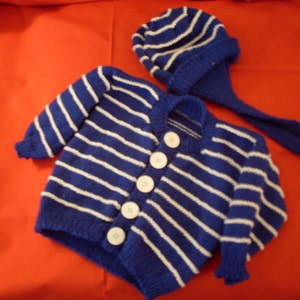 Hand-knit boy&#39;s blue and white striped cardigan and hat