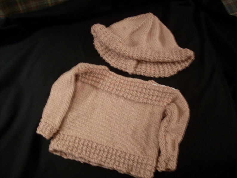 Hand-knit girl's boatneck peach pullover and sun hat image 1