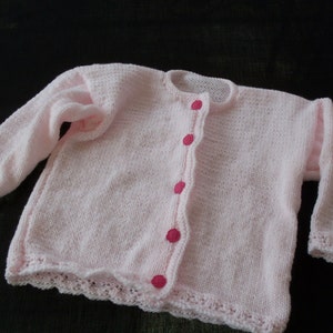 Hand knitted baby girls pastel pink cardigan
