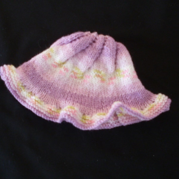 Hand knit girl's petunia (variegated) ruffle hat