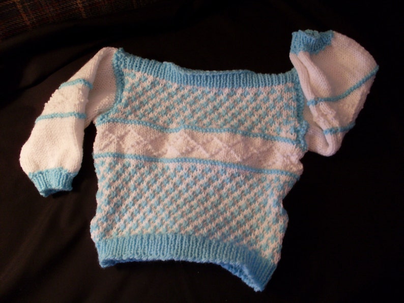 Hand-knit boy or girl boatneck turquoise and white patterned sweater