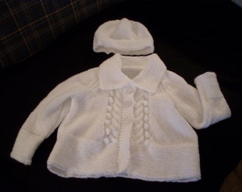 Hand knit baby girl's white cardigan and hat