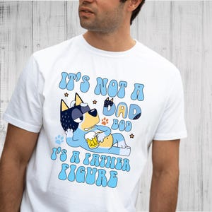 Funny Blue Dog Dad Bod Shirt, Father Figure Tee for Him, Cute Dog Cartoon Style Father’s Day Gift, Lazy Beer Dad Shirt 2025