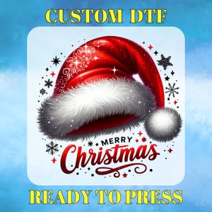 May include: A digital graphic of a red Santa hat with white fur trim and a pom-pom. The words "MERRY CHRISTMAS" are in red script, surrounded by snowflakes and stars. The text "CUSTOM DTF" and "READY TO PRESS" are in yellow.