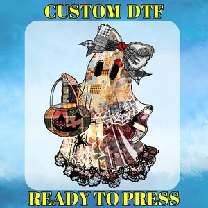 May include: A Halloween ghost design with a patchwork pattern, a large bow, and a pumpkin-shaped basket. The ghost is decorated with spiders and a spiderweb. The text "CUSTOM DTF" and "READY TO PRESS" are displayed.