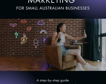 May include: A guide to mastering content marketing for small Australian businesses, with a woman sitting in a chair in front of a brick wall with neon signs. The guide is written by Karen Lewis, founder of Oceania Marketing Group.