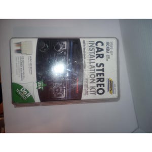 May include: A car stereo installation kit for 1989-up Honda and Acura models. The kit includes wiring and a faceplate designed to fit the car's dashboard. The packaging features the text "Car Stereo Installation Kit" and "Made in USA."