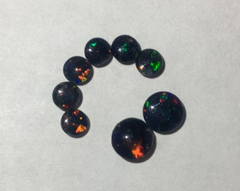 Synthetic black rainbow opals lot 8 cabochons cabs 2x - 6mm + 6x - 4mm loose flat back stones gems supplies vintage blue pink green destash