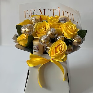 Yellow Silk flowers(roses), Lindt chocolate and Candle Bouquet Hamper