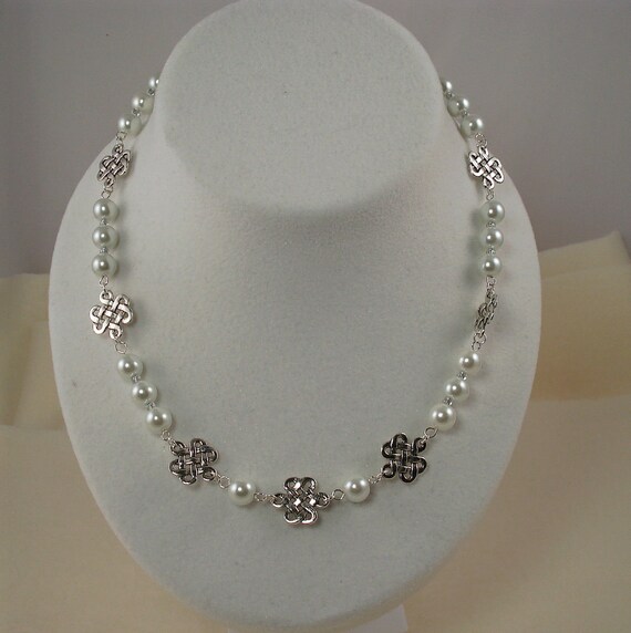 Items similar to White Pearl Celtic Knot Necklace on Etsy