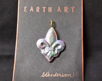 Earth Art Fleur de lis in irridescent tones of blue, silver and violet