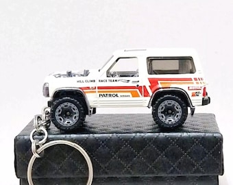 Portachiavi Auto Per Nissan Patrol – Anti-smarrimento Con Fibbia A Ferro Di Cavallo, Regalo Per Uomo E Donna - copertina
