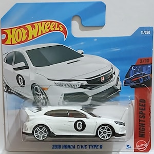 May include: A white 2018 Honda Civic Type R die-cast model car by Hot Wheels. The car features black wheels and a rear spoiler. The packaging displays the Hot Wheels logo and the word "NIGHTSPEED". Part of the 11/250 series.
