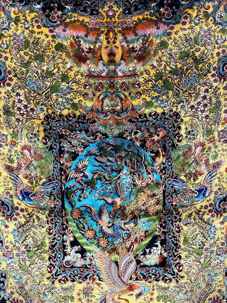 Persian silk rug with vibrant yellow Tabriz-style design featuring a mythical phoenix, intricate floral patterns, and traditional Oriental motifs. This 3x5 ft luxury carpet is ideal as wall art or floor decor. Made with fine silk for a soft texture and rich detail, perfect for adding warmth and elegance to living rooms, bedrooms, or gallery spaces. A beautiful blend of heritage and craftsmanship for art lovers and collectors.