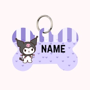 May include: A bone-shaped pet tag with a cartoon character and the word "NAME" in black. The tag has a purple and white striped awning design and small purple hearts. A silver ring is attached for easy attachment to a pet's collar.
