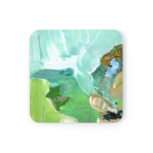 May include: Abstract art coaster with a green, blue, and white color scheme. The coaster features a variety of brushstrokes and textures.