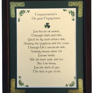 May include: A framed poem with a green background and gold trim. The poem is about love and marriage and includes the text "Congratulation's On your Engagement".