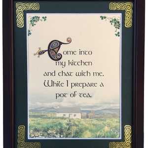 May include: A framed print with a green background and gold Celtic knot designs in the corners. The print features a handwritten quote in black ink that reads "Come into my kitchen and chat with me. While I prepare a pot of tea."