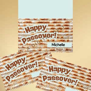 May include: Passover-themed place cards with a matzah design. The cards feature the text "Happy Passover!" in brown lettering. One card is personalized with the name "Michelle" and the word "Guest". The background is a light beige color.