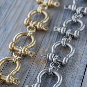 Retro Modernist Stainless Steel carabiner bracelet in silver and gold, custom length. All horse shoe bracelet, personalized length. Punk rock jewelry, statement piece for those who dare to be different.