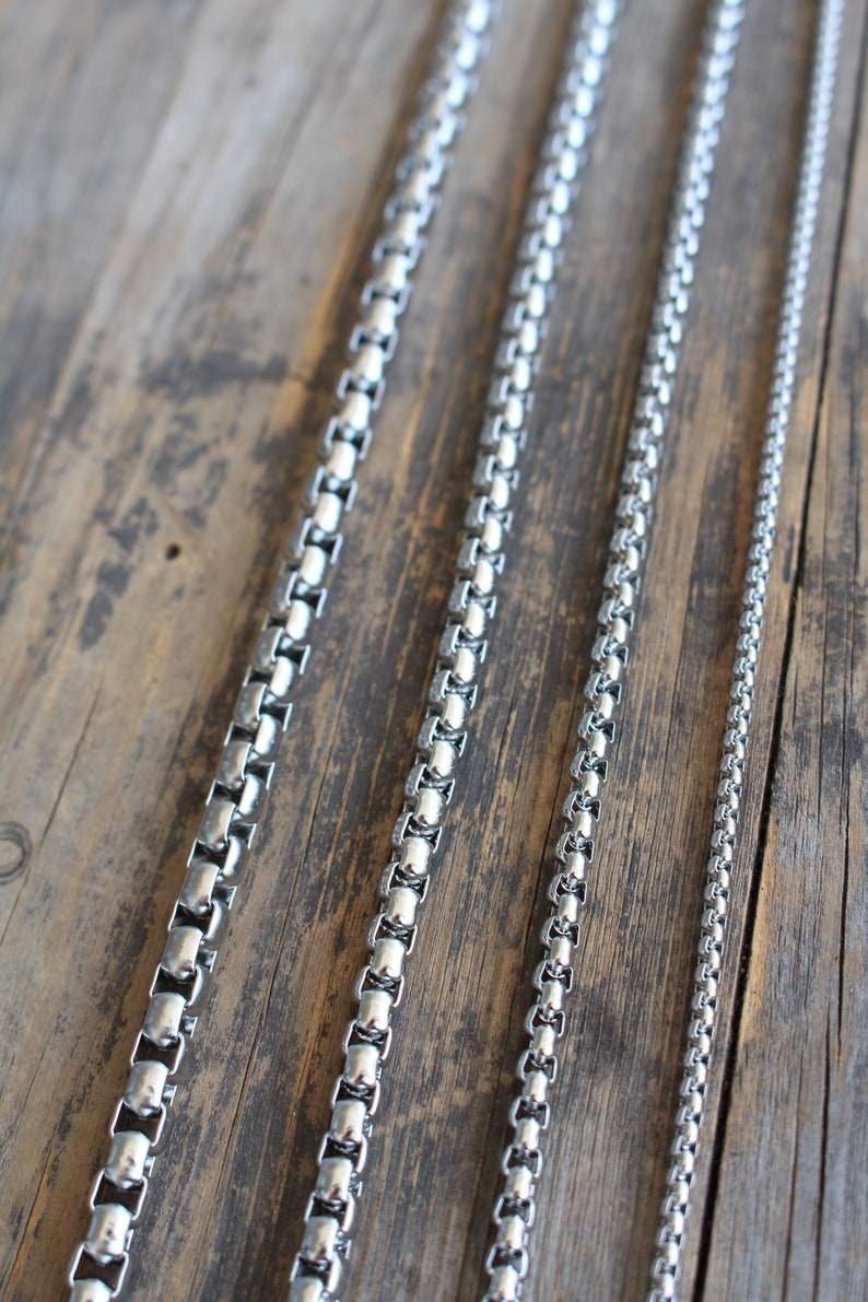 Stainless Steel Box Chain in various size lengths from 16 to 30 inches and your choice of thicknesses: 6mm, 5mm, 4mm, 2.5mm. Video shows 2.5mm thickness. Perfect chain for everyday wear. No fade, no tarnish, Sweat Proof!. Perfect for a gift. Unisex.