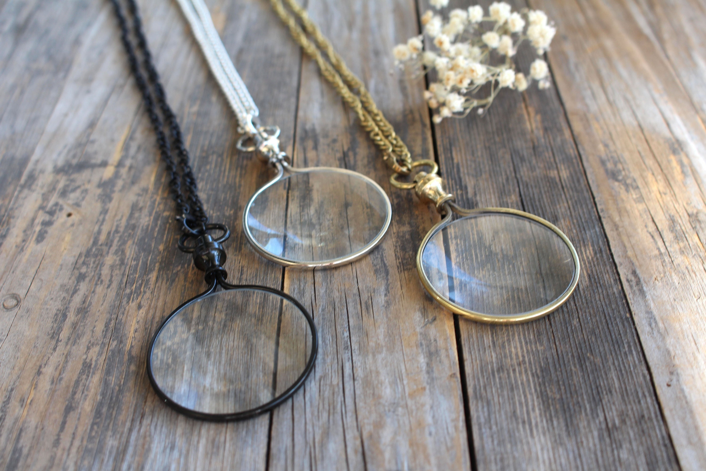 Magnifying glass necklace deals