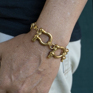 Retro Modernist Stainless Steel carabiner bracelet in silver and gold, custom length. All horse shoe bracelet, personalized length. Punk rock jewelry, statement piece for those who dare to be different.
