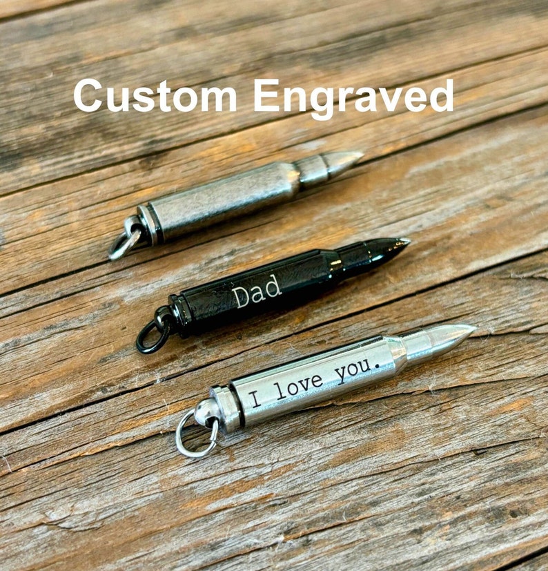 Silver, black and relic silver bullet urn necklaces for ashes.