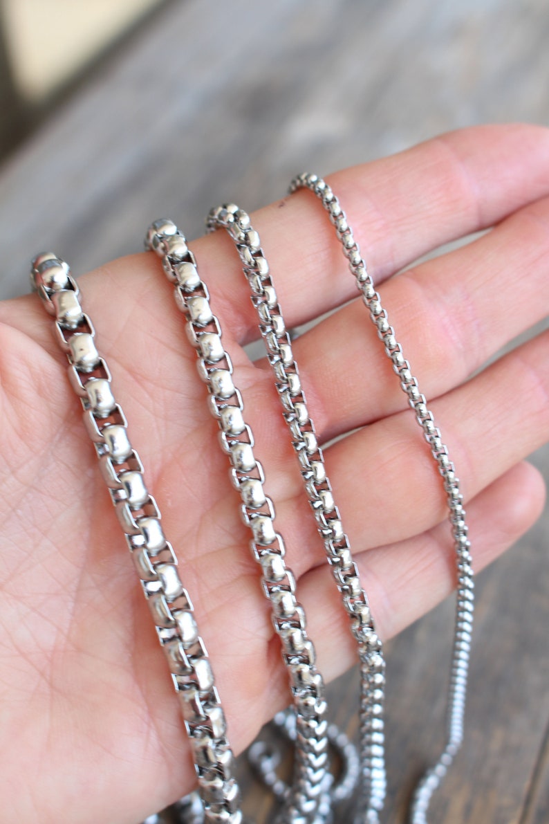 Stainless Steel Box Chain in various size lengths from 16 to 30 inches and your choice of thicknesses: 6mm, 5mm, 4mm, 2.5mm. Video shows 2.5mm thickness. Perfect chain for everyday wear. No fade, no tarnish, Sweat Proof!. Perfect for a gift. Unisex.