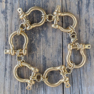 Retro Modernist Stainless Steel carabiner bracelet in silver and gold, custom length. All horse shoe bracelet, personalized length. Punk rock jewelry, statement piece for those who dare to be different.