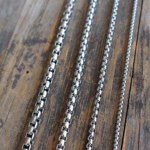 Stainless Steel Box Chain in various size lengths from 16 to 30 inches and your choice of thicknesses: 6mm, 5mm, 4mm, 2.5mm. Video shows 2.5mm thickness. Perfect chain for everyday wear. No fade, no tarnish, Sweat Proof!. Perfect for a gift. Unisex.