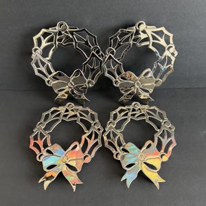 Salvamanteles vintage plateados con forma de corona navideña (juego de 4), decoración para cenas navideñas, platos calientes con patas