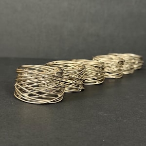 Servettringar i silvertråd, modern snöredesign, set om 6