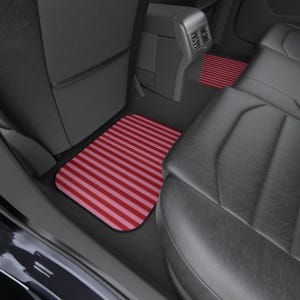 May include: A set of rectangular car floor mats featuring a repeating pattern of alternating dark red and light pink horizontal stripes. The mats are positioned on the floor of a vehicle interior with black leather seats and a center console.
